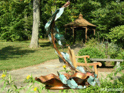 View of sculpture, garden benches and gazebo