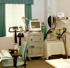 Photo of exercise equipment, including a bicycle, treadmill and computer.