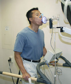 A patient performing an exercise test using a treadmill.