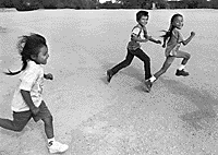 Image of Pima kids running.