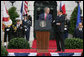 President George W. Bush delivers his remarks welcoming Prime Minister Silvio Berlusconi of Italy upon his arrival Monday, Oct. 13, 2008, during a South Lawn Arrival Ceremony for Prime Minister Silvio Berlusconi of Italy at the White House. The President said during his remarks, "With the visit today of Prime Minister Berlusconi, we reaffirm the close and trusting friendship between our two countries. For more than six decades, America and Italy have been partners in the work of freedom and progress. We look to the future with confidence." White House photo by Chris Greenberg