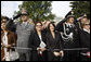 Guests attending the official White House welcome of Italian Prime Minister Silvio Berlusconi watch the ceremony on the South Lawn Monday, Oct. 13, 2008. White House photo by Eric Draper