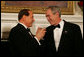 President George W. Bush and Italian Prime Minister Silvio Berlusconi raise their glasses in a toast Monday evening, Oct. 13, 2008, during a State Dinner in honor of Prime Minister Berlusconi's visit to the White House. White House photo by Joyce N. Boghosian