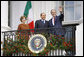 President George W. Bush andMrs. Laura Bush stand with Italian Prime Minister Silvio Berlusconi on the balcony of the South Portico of the White House Monday, Oct. 13, 2008, during Prime Minister Berlusconi's official welcome to the White House. White House photo by Eric Draper