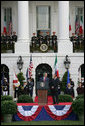 President George W. Bush delivers his remarks welcoming Prime Minister Silvio Berlusconi of Italy upon his arrival Monday, Oct. 13, 2008, during a South Lawn Arrival Ceremony for Prime Minister Silvio Berlusconi of Italy at the White House. White House photo by Chris Greenberg