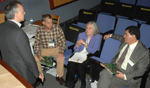 Chatting at the session are (from l) Dr. George Daley, NIDCD director Dr. James Battey, NINDS director Dr. Story Landis and NIH director Dr. Elias Zerhouni.