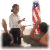 Image of teacher lecturing in a classroom
