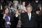 President George W. Bush gestures the 'Hook 'em, horns," the salute of the University of Texas Longhorns, as he watches the Inaugural Parade with his family and friends from the reviewing stand in front of the White House, Thursday, Jan. 20, 2005. White House photo by Paul Morse