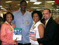 Image of NBA Hall-of-Famer Dominique Wilkins with Sabrina Harper, Quanza Brooks-Griffin, and Maurice Madden