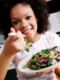 Image of young teen eating healthy food