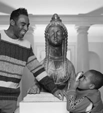 Photo of dad and child at a museum.