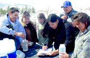 Students at Little Big Horn College perform research on water quality, one of the IDeA research projects bringing tribal colleges together with Montana universities. (Photo by Lynn Donaldson)
