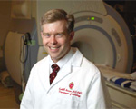 Scott Reeder and colleagues at the NCRR-funded Center for Advanced Magnetic Resonance Technology developed a new method for enhancing magnetic resonance imaging (MRI). The technology is now an easy-to-use option on many General Electric MRI instruments. (Photo courtesy of General Electric)