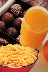 photo of orange juice, macaroni, and candy
