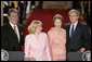 President George W. Bush and Ukraine President Viktor Yushchenko are joined at the podiums by first ladies Laura Bush and Kateryna Yushchenko Monday, April 4, 2005, in the East Room of the White House.White House photo by Paul Morse