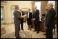 President George W. Bush talks with editors of The Papers of George Washington in the Oval Office Friday, April 29, 2005, after they presented him the latest volume, the 12th of a projected 21 volumes in the “Presidential Series” of The Papers. From left are: Ted Crackel, editor-in-chief, The Papers of George Washington; Christine Sternberg Patrick, assistant editor; Phil Chase, senior editor; John Pinheiro, former assistant editor, and Bruce Cole, chairman, National Endowment for the Humanities. White House photo by Eric Draper