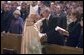 Cardinal Theodore McCarrick greets President George W. Bush and Mrs. Laura Bush after mass at the Cathedral of Saint Matthew the Apostle in Washington, DC on Saturday, April 2, 2005 in remembrance of Pope John Paul II. White House photo by Paul Morse