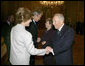 President George W. Bush and first lady Laura Bush are greeted upon their arrival to Quirinale Palace by Italy's President and first lady, Carlo and Franca Ciampi, Thursday, April 7, 2005. President and Mrs. Bush paid the courtesy visit while in Rome for the funeral of Pope John Paul II. White House photo by Eric Draper