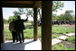 President George W. Bush and Israeli Prime Minister Ariel Sharon wave to the press while meeting at the President's Ranch in Crawford, Texas, Monday, April 11, 2005. White House photo by David Bohrer