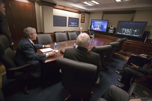 President George W. Bush participates in a secure video teleconference with Iraqi Prime Minister Nouri al-Maliki from the newly-renovated Situation Room at the White House Thursday, Jan. 4, 2007. Vice President Dick Cheney is pictured sitting next to the President. White House photo by Eric Draper