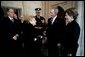 President George W. Bush and Mrs. Laura Bush greet former first lady Betty Ford and her son, Steven Ford, upon their arrival for the State Funeral service for former President Gerald R. Ford at the National Cathedral in Washington, D.C., Tuesday, Jan. 2, 2007. White House photo by Eric Draper