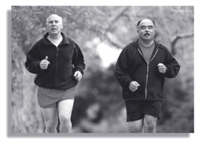 Photo of two older men jogging.