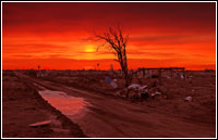 Sunrise at Holly Beach. Two images combined to show the depth of beauty and depth of destruction at Holly Beach when a huge tidal surge destroyed this 500 home community. FEMA is working with the local Parishes (Counties) who have requested FEMA's help in removing debris left by Hurricane Rita on Public and Private Property. Marvin Nauman/FEMA photo