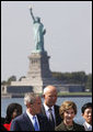 President George W. Bush and Mrs. Laura Bush participate in a photo opportunity with political dissidents Tuesday, Sept. 23, 2008, on Governors Island in New York. "I've been inspired by the stories I have heard here," said Mrs. Bush in her remarks as she noted the plight of the Burmese people and their struggle for democracy and human rights. White House photo by Eric Draper