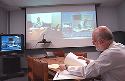 Myron Weiner, M.D., conducting the telemedicine program