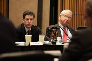 Carney, left, pondered the comments of Board members