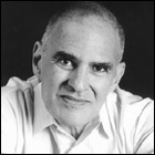 Larry Kramer, writer and early AIDS activist, asserted his concerns in animated dialog between the AIDS community and people who guided government policy.