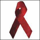 The looped red ribbon became the universal symbol of AIDS awareness.