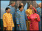 President George W. Bush shares a light moment with Chile's President Michelle Bachalet as APEC leaders posed for an official portrait Sunday, Nov. 19, 2006, before adjourning the 2006 APEC Summit in Hanoi. White House photo by Eric Draper