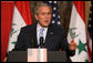 President George W. Bush responds to a question Thursday, Nov. 30, 2006, during a joint press availability in Amman, Jordan, with Iraq's Prime Minister Nouri al-Maliki. White House photo by Paul Morse