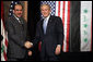 President George W. Bush and Prime Minister Nouri al-Maliki shake hands after a joint press availability Thursday, Nov. 30, 2006, in Amman, Jordan. The leaders later issued a joint statement in which they said they were, "Pleased to continue our consultations on building security and stability in Iraq." White House photo by Paul Morse