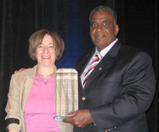 Dr. Keith C. Ferdinand of ABC presenting the award to Dr. Anne E. Sumner