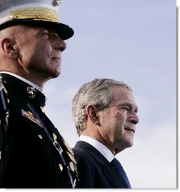 President George W. Bush stands with Commandant of the Marine Corps, General Michael Hagee, at the dedication ceremony of the National Museum of the Marine Corps Friday, Nov. 10, 2006, in Quantico, Va. White House photo by Paul Morse