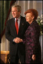 President George W. Bush and Latvia's President Vaira Vike-Freiberga exchange handshakes Tuesday, Nov. 28, 2006, during their meeting at Riga Castle in Riga, Latvia. White House photo by Eric Draper