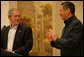 President George W. Bush and Prime Minister Lee Hsien Loong of Singapore deliver remarks during a dinner Thursday, November 16, 2006. The President congratulated the people of Singapore "for being such a vivid example of enterprise and markets and hard work." White House photo by Shealah Craighead