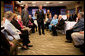 President George W. Bush and Senator Charles, Grassley, R-Iowa, talk with residents about Medicare prescription drug benefits at Wesley Acres Senior Center in Des Moines, Iowa, Tuesday, April 11, 2006. "Every senior is saving money, and that's what people have got to know.," said the President. "There is an easy way to find out how the program works, and that's to call 1-800-Medicare, or you can go on the computer systems at Medicare.gov." White House photo by Eric Draper