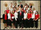 President George W. Bush stands with members of the University of Maryland Women’s Field Hockey Team Thursday, April 6, 2006, during a photo opportunity with the 2005 and 2006 NCAA Sports Champions at the White House. White House photo by Kimberlee Hewitt