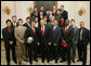 President George W. Bush stands with members of the University of Maryland Men’s Soccer Team Thursday, April 6, 2006, during a photo opportunity with the 2005 and 2006 NCAA Sports Champions at the White House. White House photo by Kimberlee Hewitt