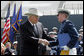 Vice President Dick Cheney shakes hands with Andrew Sellers, the first graduate to receive his diploma in the U.S. Air Force Academy Class of 2005, during the commencement ceremony in Colorado on Wednesday, June 1, 2005. The graduate was deemed the outstanding cadet for academic performance, military performance and in the field of computer science. White House photo by David Bohrer