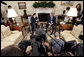 President George W. Bush and South Korean President Roh Moo-hyun talk with the press in the Oval Office Friday, June 10, 2005. White House photo by Paul Morse