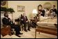 As the media looks on, President George W. Bush and South Africa's President Thabo Mbeki visit in the Oval Office Wednesday, June 1, 2005. White House photo by Eric Draper