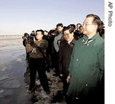 Chinese Premier Wen Jiabao, right, inspects water pollution of Songhuajiang River in Harbin, Saturday