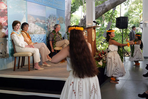 Mrs. Laura Bush and Hawaiian Gov. Linda Lingle watch traditional Hawaiian dancers at the Northwest Hawaiian Islands Marine National Monument Naming Ceremony, Friday, March 2, 2007 in Honolulu, where Laura Bush unveiled the new Hawaiian name as Papahanaumokuakea Marine National Monument. The name for the recently established marine sanctuary was developed by state and federal officials working with native Hawaiian leaders. White House photo by Shealah Craighead