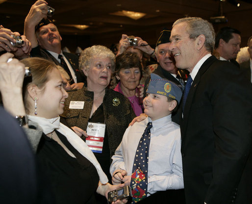 President George W. Bush poses for a photo after addressing the American Legion 47th National Convention, Tuesday, March 6, 2007, in Washington, D.C. White House photo by Eric Draper