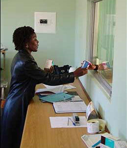 Nurse Peggy Thumpe dispenses ARVs at the Middlespits Clinic