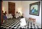 A photographer records a meeting between Mrs. Laura Bush and Mrs. Margarita Zavala, wife of Mexico President Felipe Calderon, during their visit Tuesday, March 13, 2007, in Temozon Sur, Mexico. White House photo by Shealah Craighead